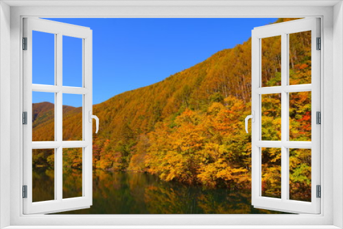 Fototapeta Naklejka Na Ścianę Okno 3D - Japanese autumn forest and dam lake