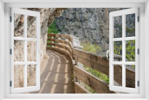 Fototapeta Naklejka Na Ścianę Okno 3D - panoramic route to Sanctuary of San Romedio trentino, Trentino alto adige, northern italy  - Europe. Panoramic trail carved into the rock of the canyon