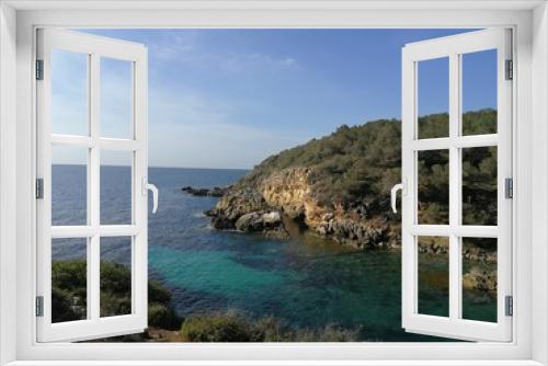 Fototapeta Naklejka Na Ścianę Okno 3D - Seaview of the beach of the Mallorca coastline with turquoise waters and blue sky 