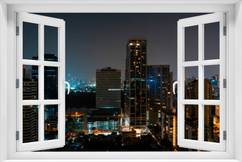 Fototapeta Naklejka Na Ścianę Okno 3D - Night view of Bangkok city. The calm night over the biggest town of Thailand.