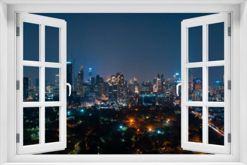 Fototapeta Naklejka Na Ścianę Okno 3D - Night view of Bangkok city. The calm night over the biggest town of Thailand.