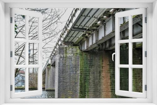 Fototapeta Naklejka Na Ścianę Okno 3D -  Iron railway bridge over the River Bure in the village of Hoveton and Wroxham