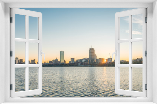 Fototapeta Naklejka Na Ścianę Okno 3D - Boston cityscape with river in front at sunrise