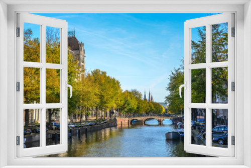 Fototapeta Naklejka Na Ścianę Okno 3D - Cityscape with canal of Amsterdam, Holland