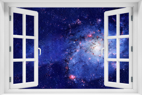 Fototapeta Naklejka Na Ścianę Okno 3D - A beautiful blue galaxy in deep space. Elements of this image furnished by NASA