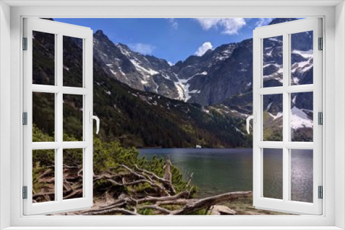 Fototapeta Naklejka Na Ścianę Okno 3D - Image of Rysy Mountain and Morskie Oko lake in May