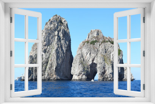 Fototapeta Naklejka Na Ścianę Okno 3D - Capri , Italy: The famous Faraglioni rock stacks