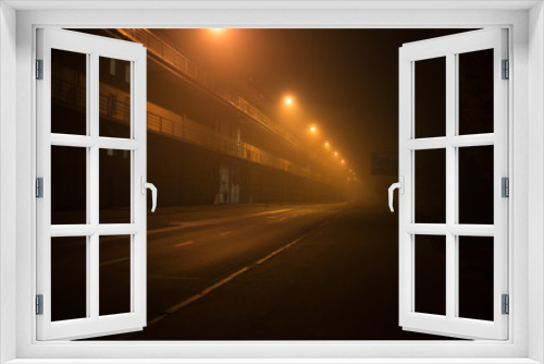 Fototapeta Naklejka Na Ścianę Okno 3D - Highway at night in the fog in the city