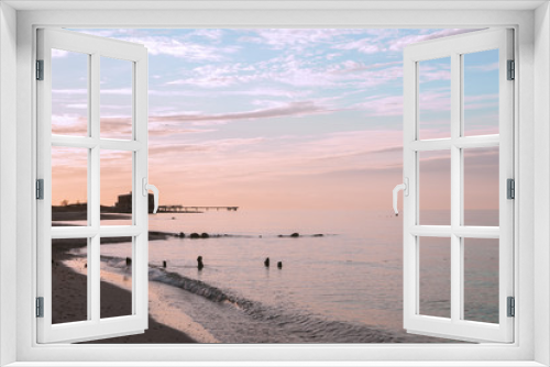 Fototapeta Naklejka Na Ścianę Okno 3D - idyllic coastline with scenic evening sky bathed in warm pastel colors