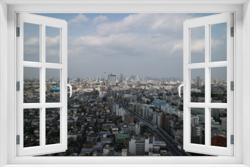 Fototapeta Naklejka Na Ścianę Okno 3D - 高層ビル（キャロットタワー）からの東京を眺める