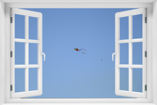 Fototapeta Naklejka Na Ścianę Okno 3D - blue sky with birdie and kite toy, image for advertising