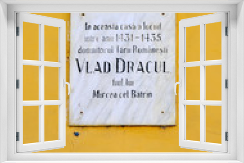 Fototapeta Naklejka Na Ścianę Okno 3D - Plaque on house of Dracula in Sighisoara Romania that Vlad Dracul lived there from 1431-1435