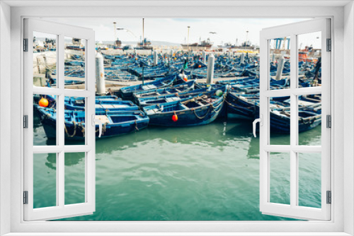 Fototapeta Naklejka Na Ścianę Okno 3D - Small blue wooden fishing boats in the port of Essaouira in Morocco atlantic ocean.