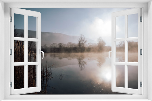 Fototapeta Naklejka Na Ścianę Okno 3D - Mystical lake on a foggy morning