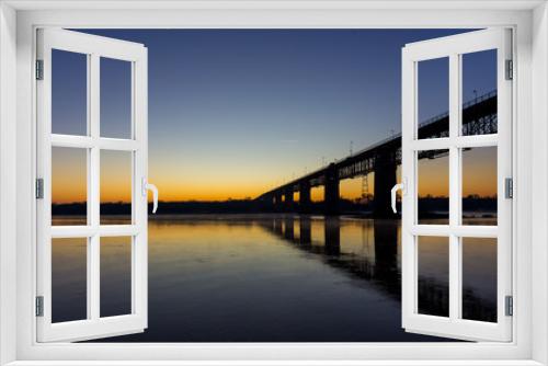 Fototapeta Naklejka Na Ścianę Okno 3D - Sunrise near a river and a bridge in Portugal
