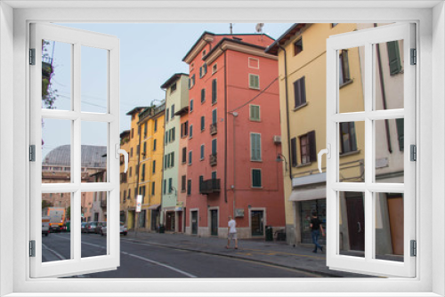 Fototapeta Naklejka Na Ścianę Okno 3D - Colored houses in San Faustino street in Brescia, Lombardy, Italy.