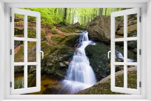 Fototapeta Naklejka Na Ścianę Okno 3D - Waterfall on a creek in the mountains