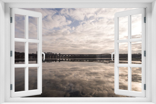 Fototapeta Naklejka Na Ścianę Okno 3D - panoramic view of sky being reflected on mirror like icy lake