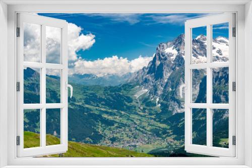 Fototapeta Naklejka Na Ścianę Okno 3D - Switzerland, Panoramic view on Grindelwald valley and Wetterhorn and green Alps around