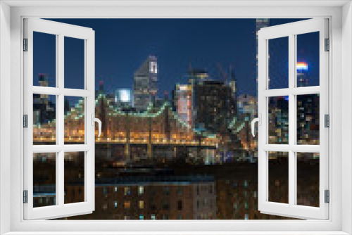 Fototapeta Naklejka Na Ścianę Okno 3D - Panoramic Cityscape View of New York City at night with illuminated skyscrapers and bridges inside urban city center