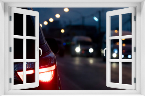 Fototapeta Naklejka Na Ścianę Okno 3D - Blurred image of cars on the road with light break at in night.