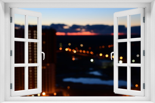 Fototapeta Naklejka Na Ścianę Okno 3D - Blurred midnight city backgound., view from window.