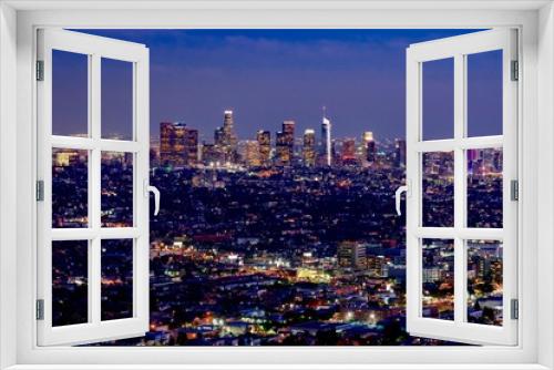 Fototapeta Naklejka Na Ścianę Okno 3D - panoramic view of the city of Los Angeles illuminated at night in California