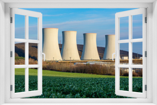 Fototapeta Naklejka Na Ścianę Okno 3D - Nuclear Power Plant with the Blue Sky in The Background