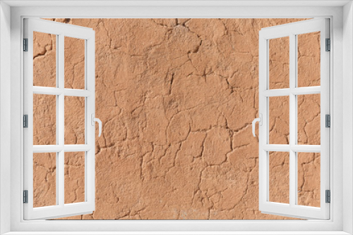 Fototapeta Naklejka Na Ścianę Okno 3D - Detail of a cracked clay wall
