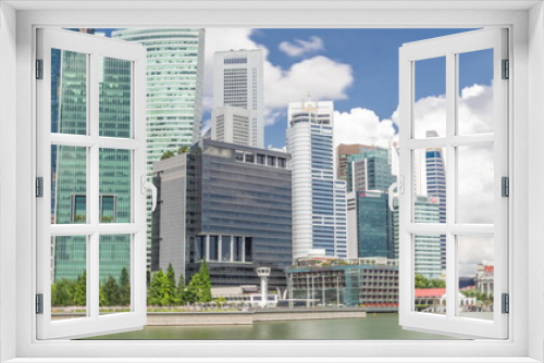 Fototapeta Naklejka Na Ścianę Okno 3D - Business Financial Downtown City and Skyscrapers Tower Building at Marina Bay timelapse hyperlapse, Singapore,
