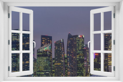 Fototapeta Naklejka Na Ścianę Okno 3D - Business Financial Downtown City and Skyscrapers Tower Building at Marina Bay day to night timelapse, Singapore