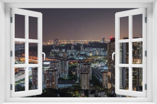 Fototapeta Naklejka Na Ścianę Okno 3D - City skyline with commercial port of Singapore aerial night timelapse.