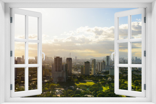 Fototapeta Naklejka Na Ścianę Okno 3D - Makati skyline Manila, The Philippines at sunset.