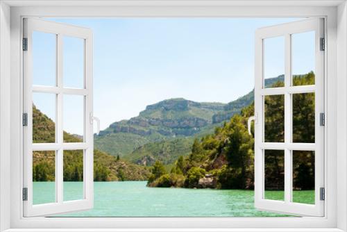 Fototapeta Naklejka Na Ścianę Okno 3D - Natural lake with mountains in Cofrentes (Spain)