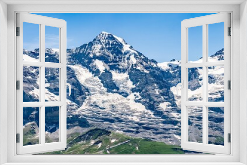 Fototapeta Naklejka Na Ścianę Okno 3D - Switzerland, Panoramic view on Eiger, Monch and Jungfraujoch and green Alps around