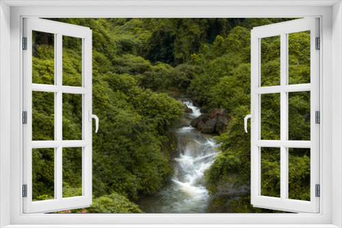 Fototapeta Naklejka Na Ścianę Okno 3D - A small waterfall