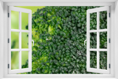 Fototapeta Naklejka Na Ścianę Okno 3D - Broccoli inflorescences with water drops on a white background. Macro photography a green vegetable, close-up