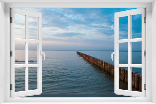 Fototapeta Naklejka Na Ścianę Okno 3D - falochron nad morzem