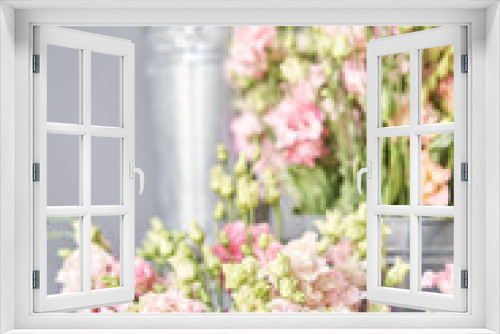 Fototapeta Naklejka Na Ścianę Okno 3D - Bouquet of Beautiful pink, white, green color eustoma in vase . Spring flowers in the cold room of the flower shop.