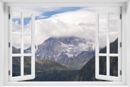 Fototapeta Naklejka Na Ścianę Okno 3D - The mountains of Switzerland, the summits of the mountains with snow in summer