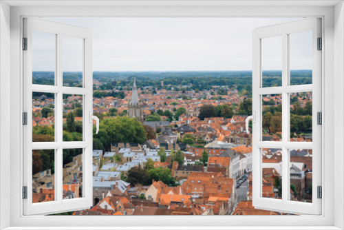 Fototapeta Naklejka Na Ścianę Okno 3D - Panoramic view from the Belfort tower on the historic part of Bruges and the Cathedral of St. Salvator, the main pedestrian street with many shops, Belgium. Travel to Belgium.