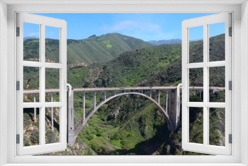 Fototapeta Naklejka Na Ścianę Okno 3D - Aerial Shot of an Arch Bridge