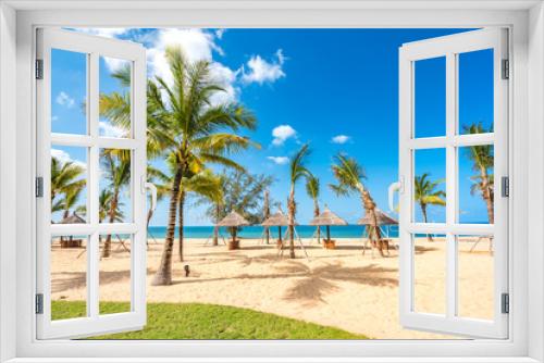 Fototapeta Naklejka Na Ścianę Okno 3D - Coastal Scenery of The Long Beach on Phu Quoc Island, Vietnam, a Popular Tourism Destination for Summer Vacation in Southeast Asia, with Tropical Climate and Beautiful Landscape.