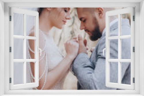 Bride and Groom at wedding Day walking Outdoors on spring nature. Bridal couple,  Loving wedding couple outdoor. 