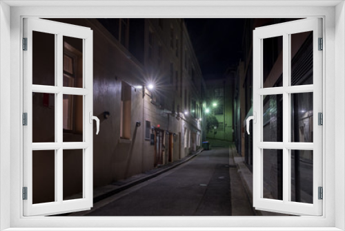 Fototapeta Naklejka Na Ścianę Okno 3D - narrow old street at night
