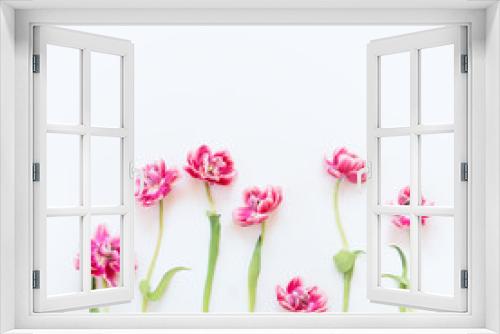 Fototapeta Naklejka Na Ścianę Okno 3D - Delicate pink tulips with stems and leaves on white background. Floral border. Springtime concept. Mother day greeting card. Beauty
