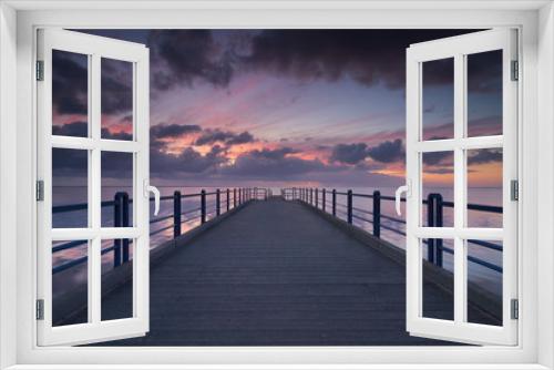 Fototapeta Naklejka Na Ścianę Okno 3D - Morning at the seaside during sunrise and pier