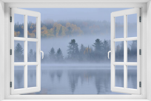 Fototapeta Naklejka Na Ścianę Okno 3D - morning mist over lake with island in autumn colour Algonquin park Ontario Canada