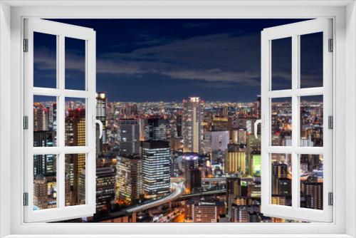 Fototapeta Naklejka Na Ścianę Okno 3D - Night view of Osaka Urban skyline