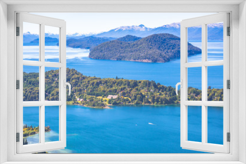 Fototapeta Naklejka Na Ścianę Okno 3D - Andean lakes with mountains around blue sky and green vegetation in Argentine Patagonia in Bariloche
